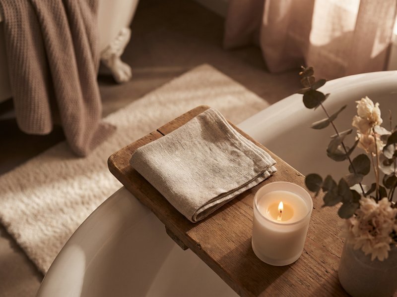ADHD bath ritual — a warm washcloth and dim candlelight sensory setup, lacedopamine.com