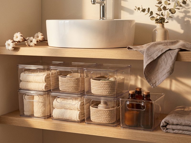 ADHD home organization ideas — clear stackable bins under a bathroom sink, lacedopamine.com