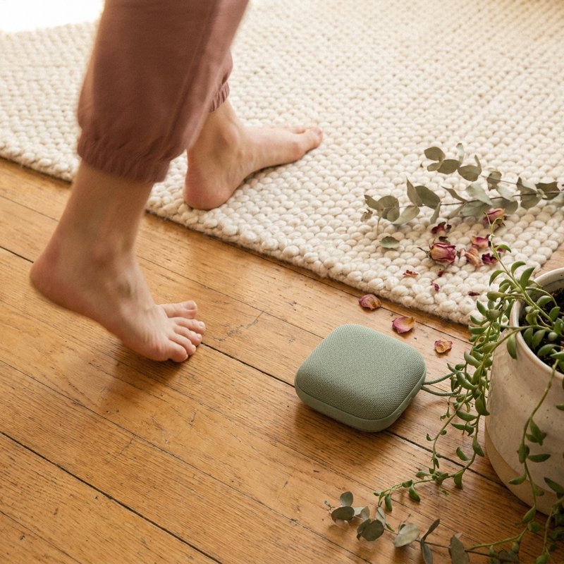 adhd paralysis — bare feet moving on a warm wooden floor beside a speaker, lacedopamine.com