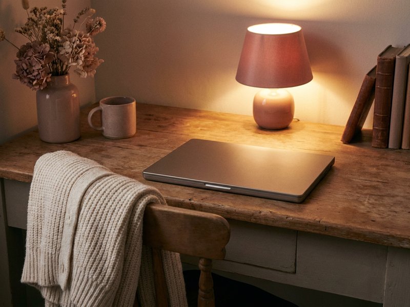 sensory overload recovery ADHD — a closed laptop on a quiet desk in the evening, lacedopamine.com