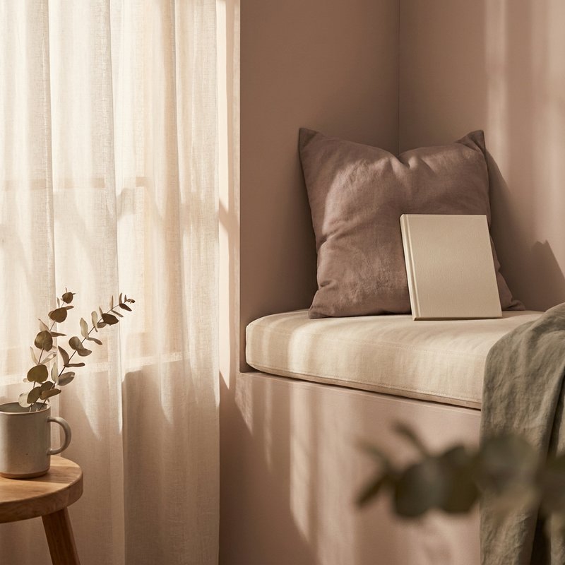 soft girl self care ADHD — a woman resting quietly with a journal closed beside her, lacedopamine.com