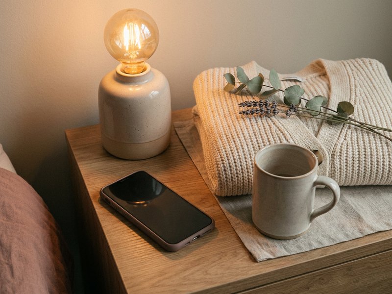 wind down routine ADHD — dim lights and a phone left face down before bed, lacedopamine.com