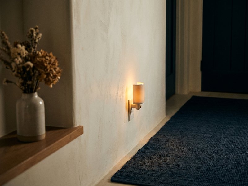 ADHD sleep struggles — a small night light glowing in a dark hallway, lacedopamine.com