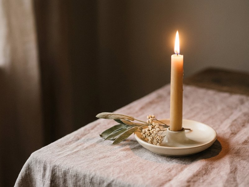 ADHD wind down routine — a single lit candle used as a start signal, lacedopamine.com