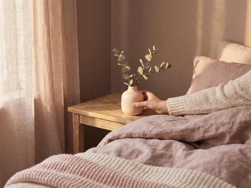 decor mistakes that overstimulate ADHD brains — a calm corner with one dominant soft color and a single decorative object, lacedopamine.com