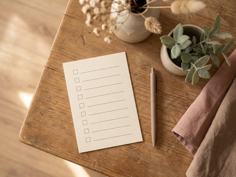 soft self care routine ADHD — a blank weekly checklist on a desk, lacedopamine.com
