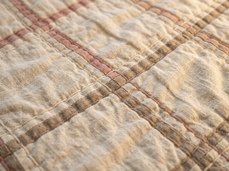 weighted blanket ADHD — a close up of blanket stitching and fabric texture, lacedopamine.com