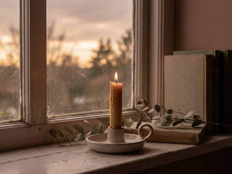 working with ADHD brain — a candle burning low on a warm windowsill, lacedopamine.com